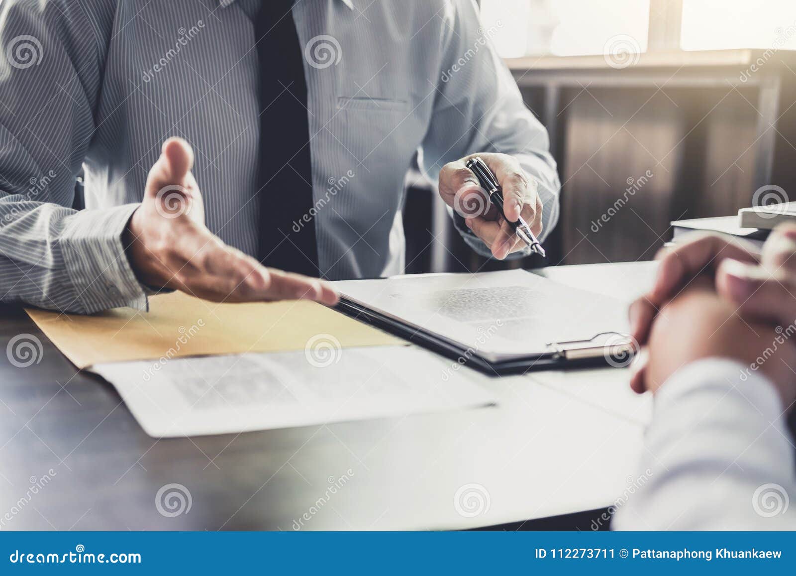 businessman and male lawyer or judge consult having team meeting