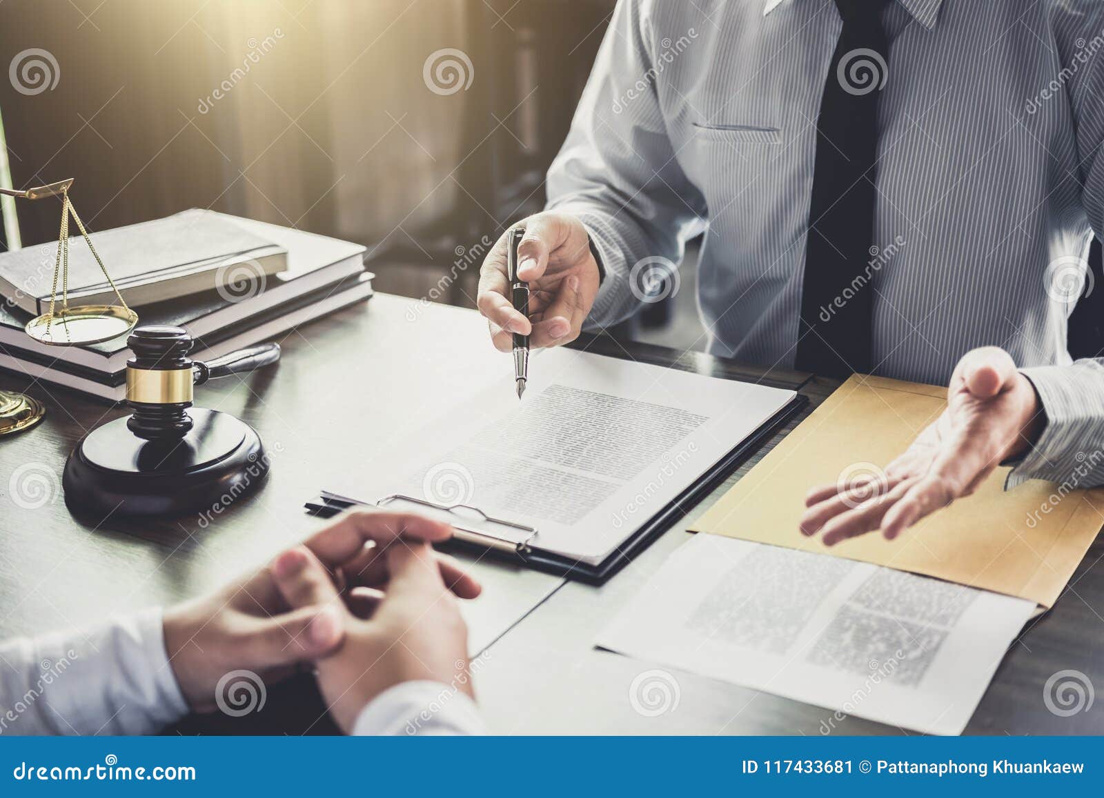 businessman and male lawyer or judge consult having team meeting