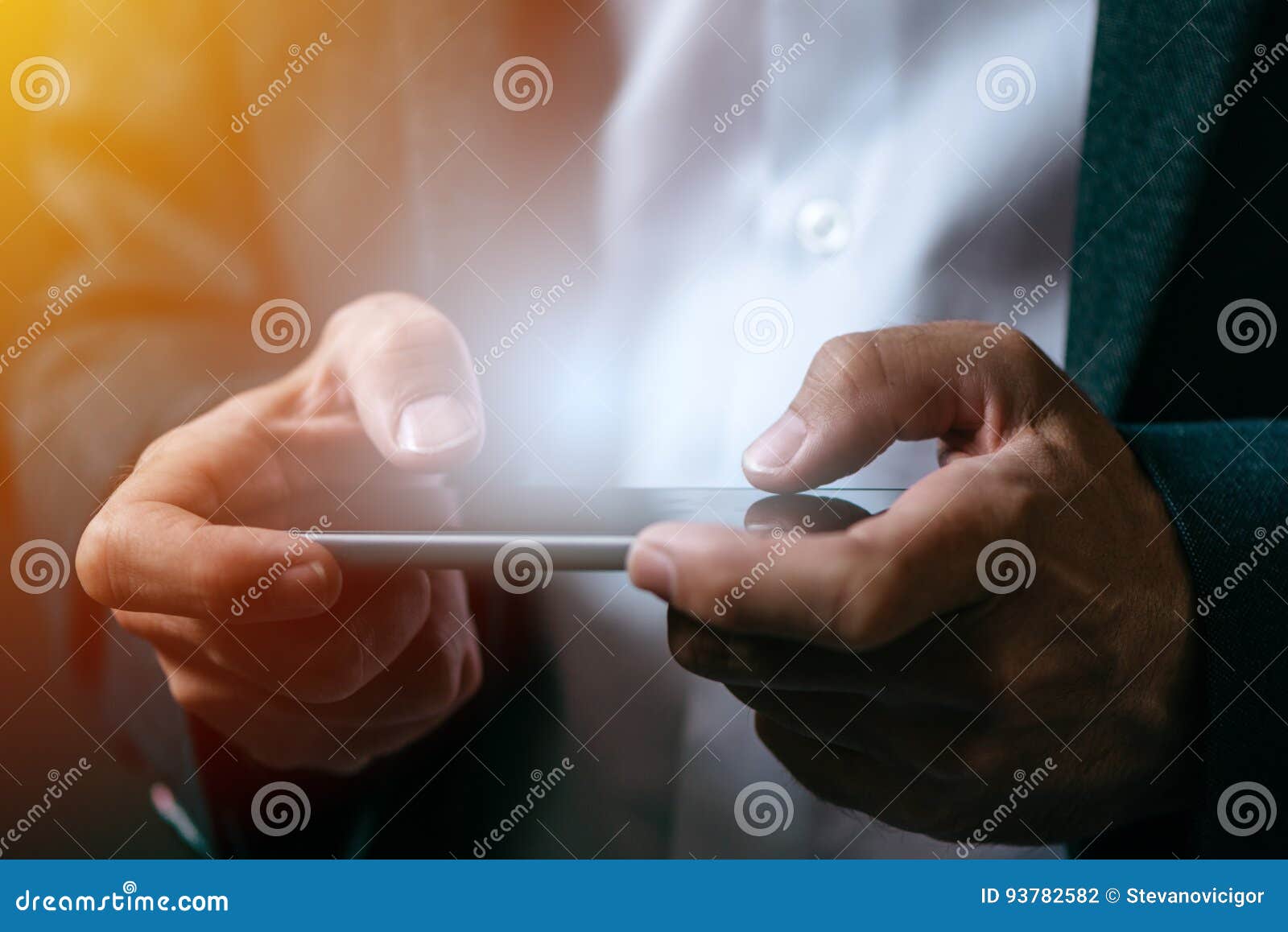 businessman playing mobile app video game on smart phone