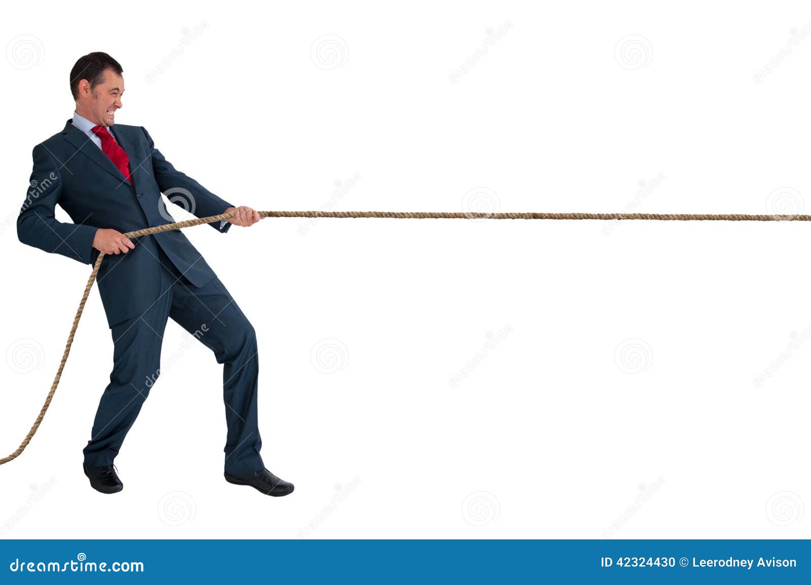Businessman pulling a rope stock photo. Image of pulling - 42324430