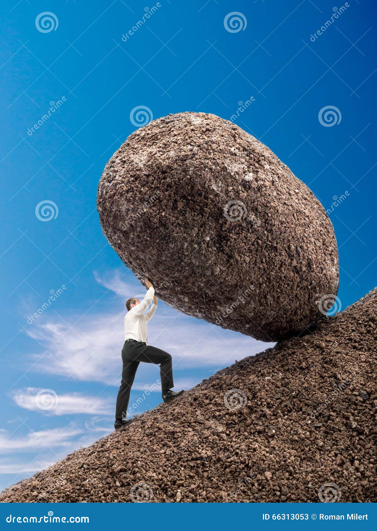 businessman pushing up boulder