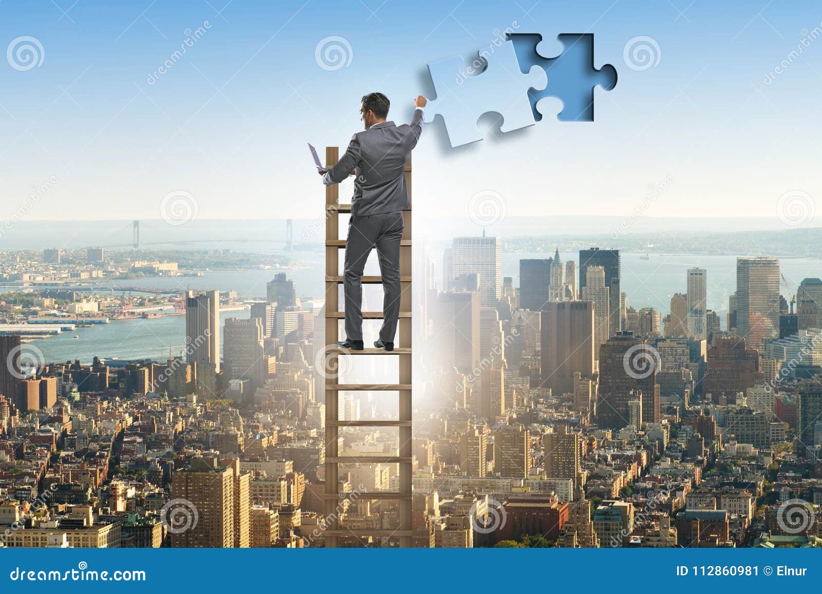 The Businessman Putting Together Jigsaw Puzzle Pieces Stock Image