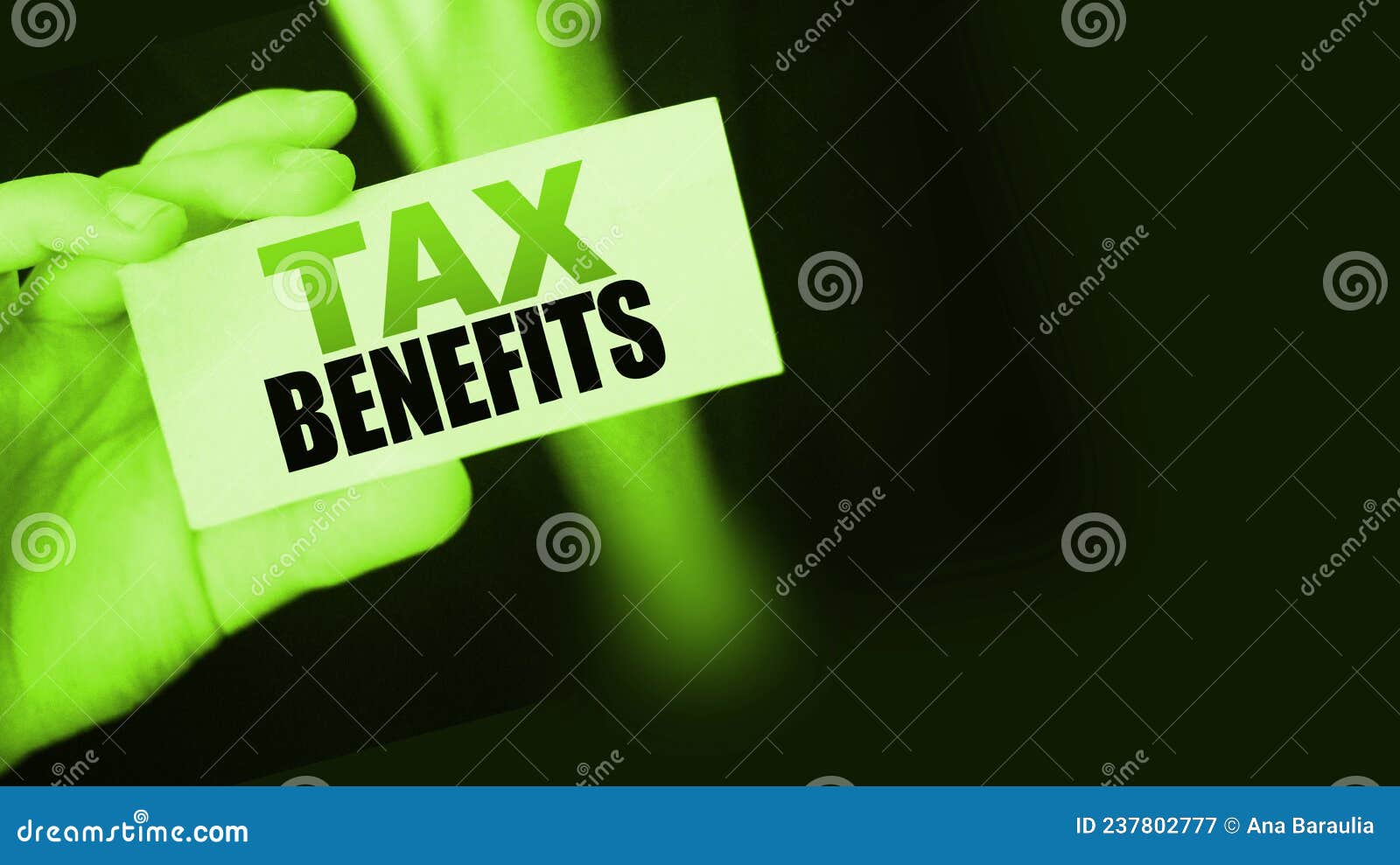 businessman-shows-a-card-with-text-tax-benefits-taxes-and-fees-policy