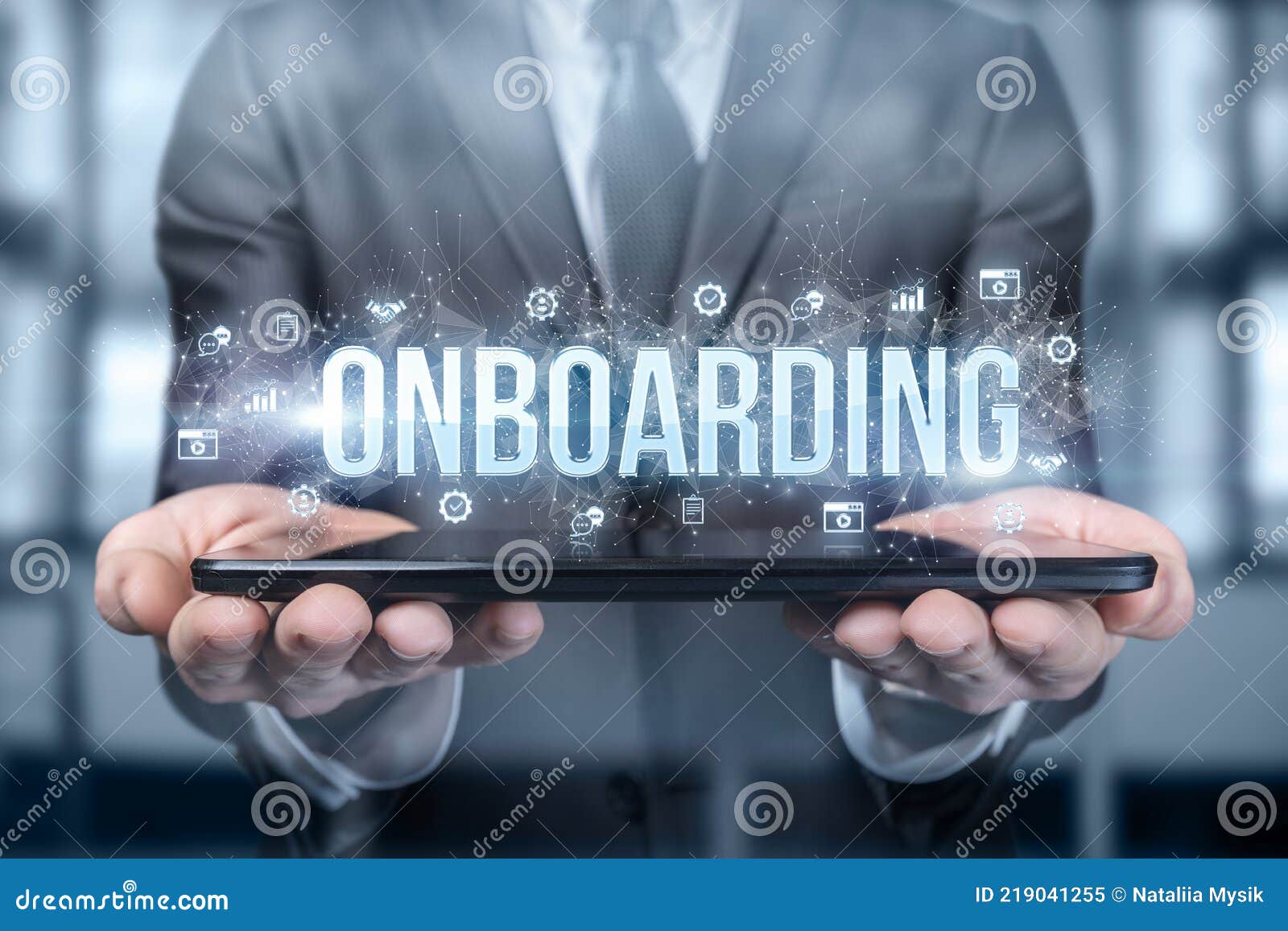 businessman shows on the tablet the word onboarding