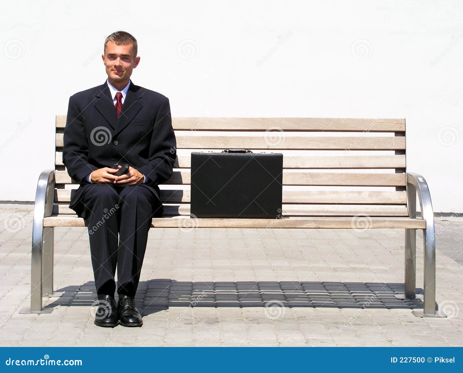 Businessman Sitting On Bench Stock Photo Image Of Waiting