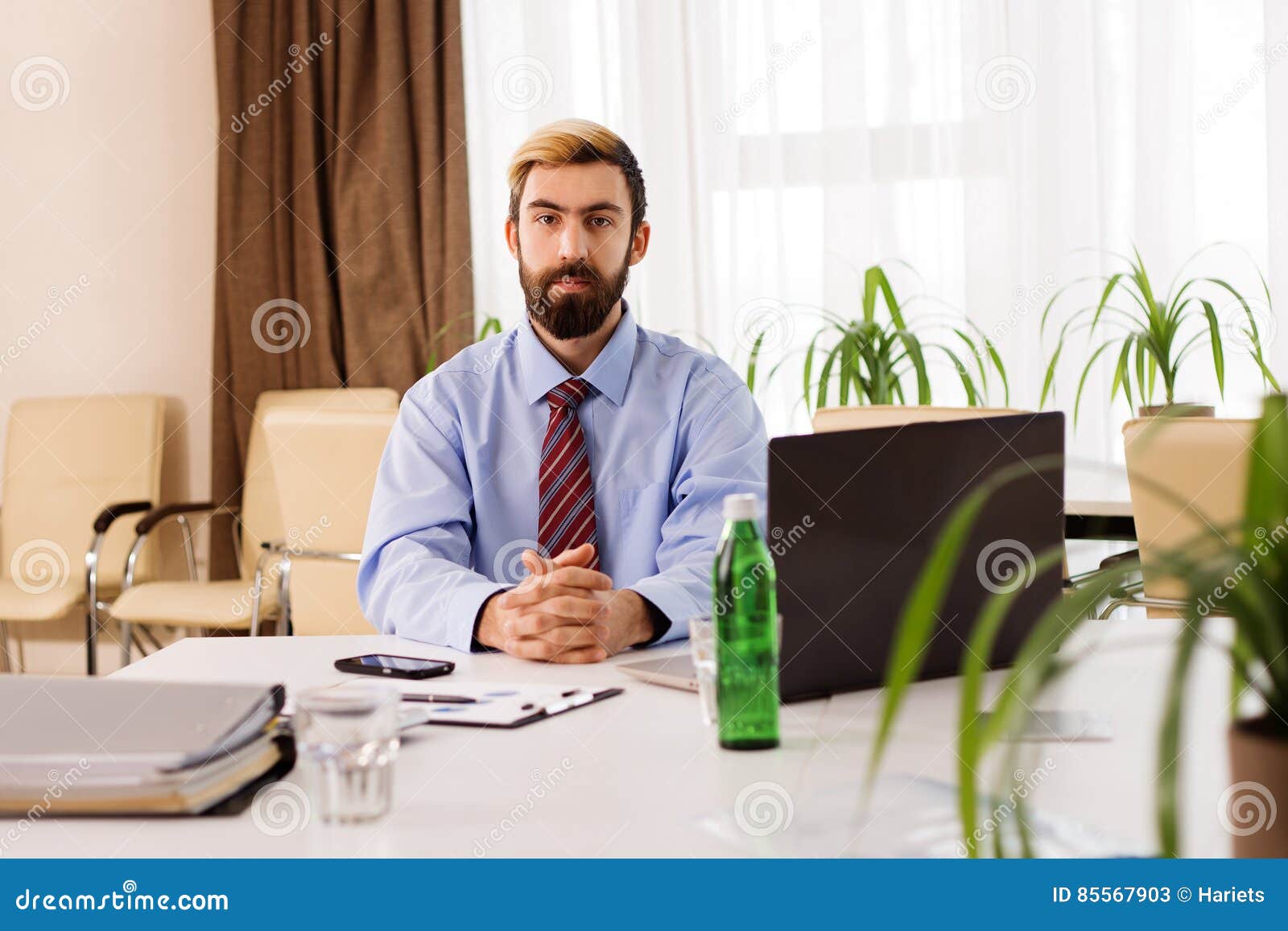 Businessman Sitting at a Desk with Laptop Stock Image Image of laptop