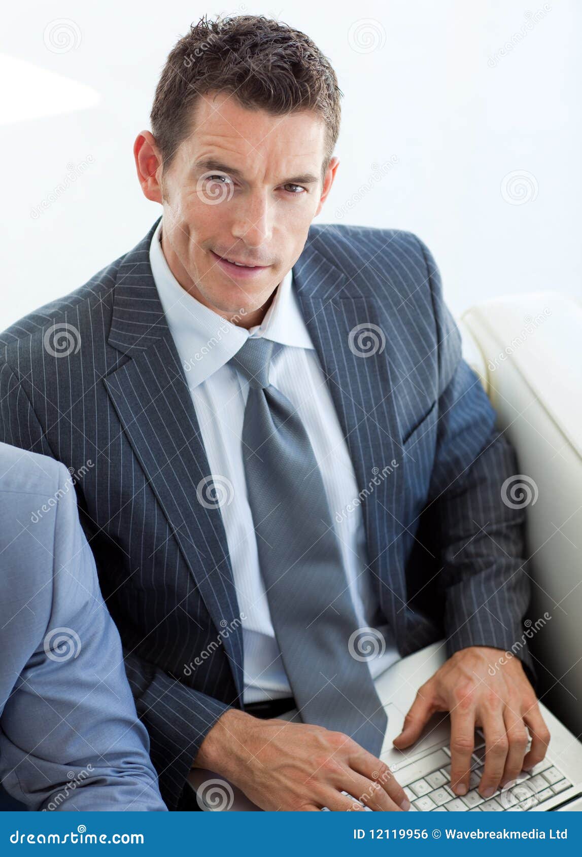 Businessman Sitting in a Waiting Room Stock Photo Image of couch