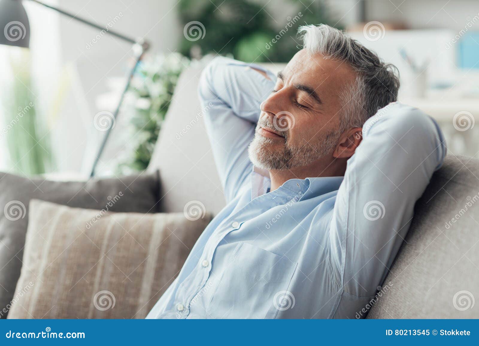 businessman sleeping on the couch