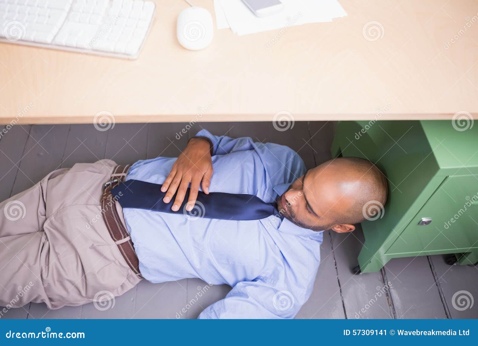 Businessman Sleeping Under Desk Stock Image Image Of Male
