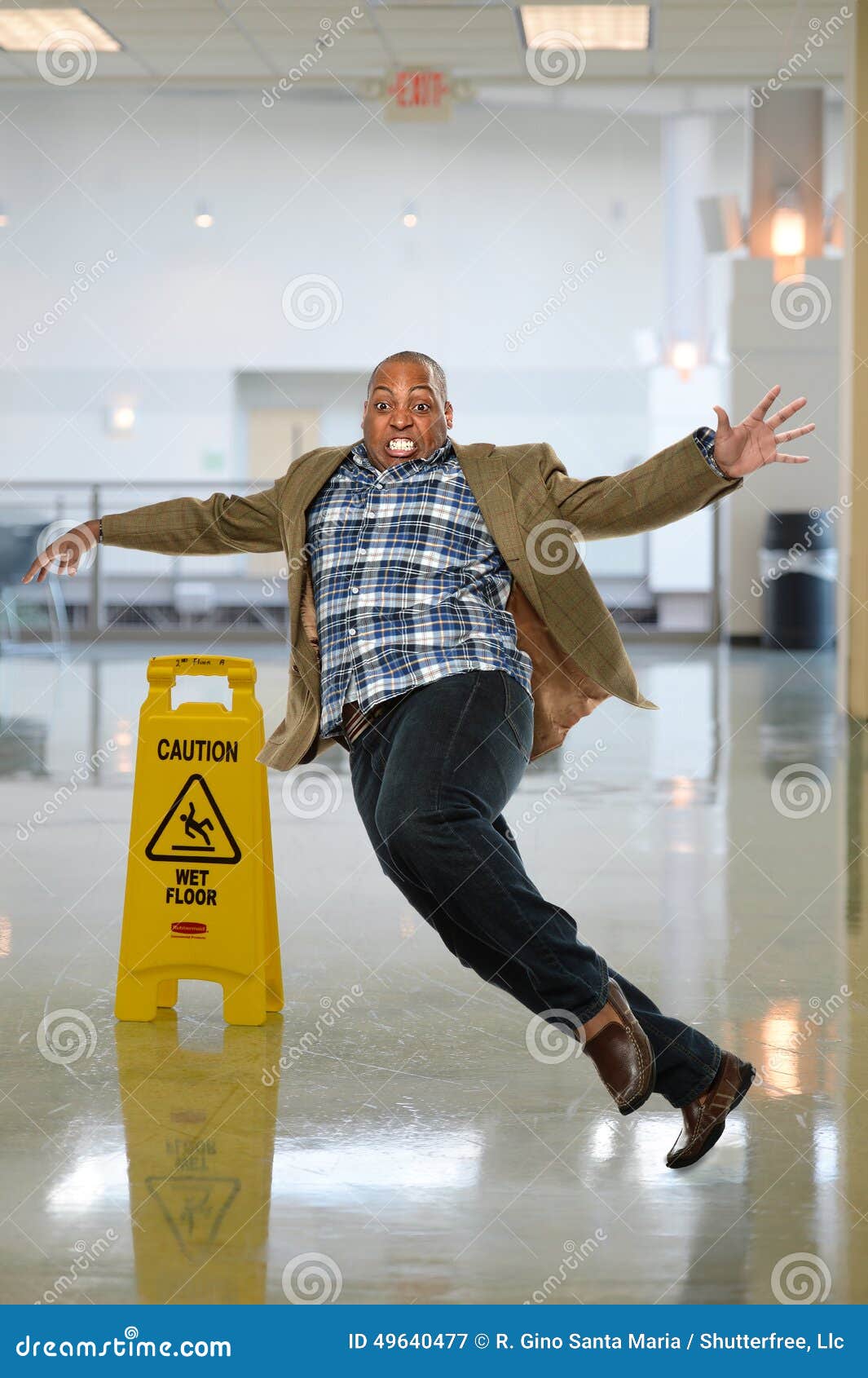businessman slipping on wet floor