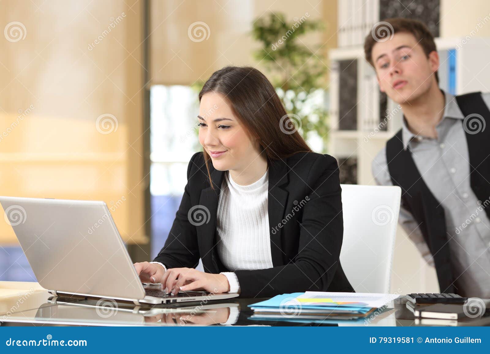 businessman spying his colleague at job