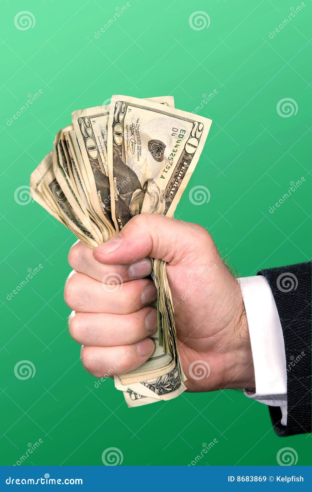 businessman squeezing cash