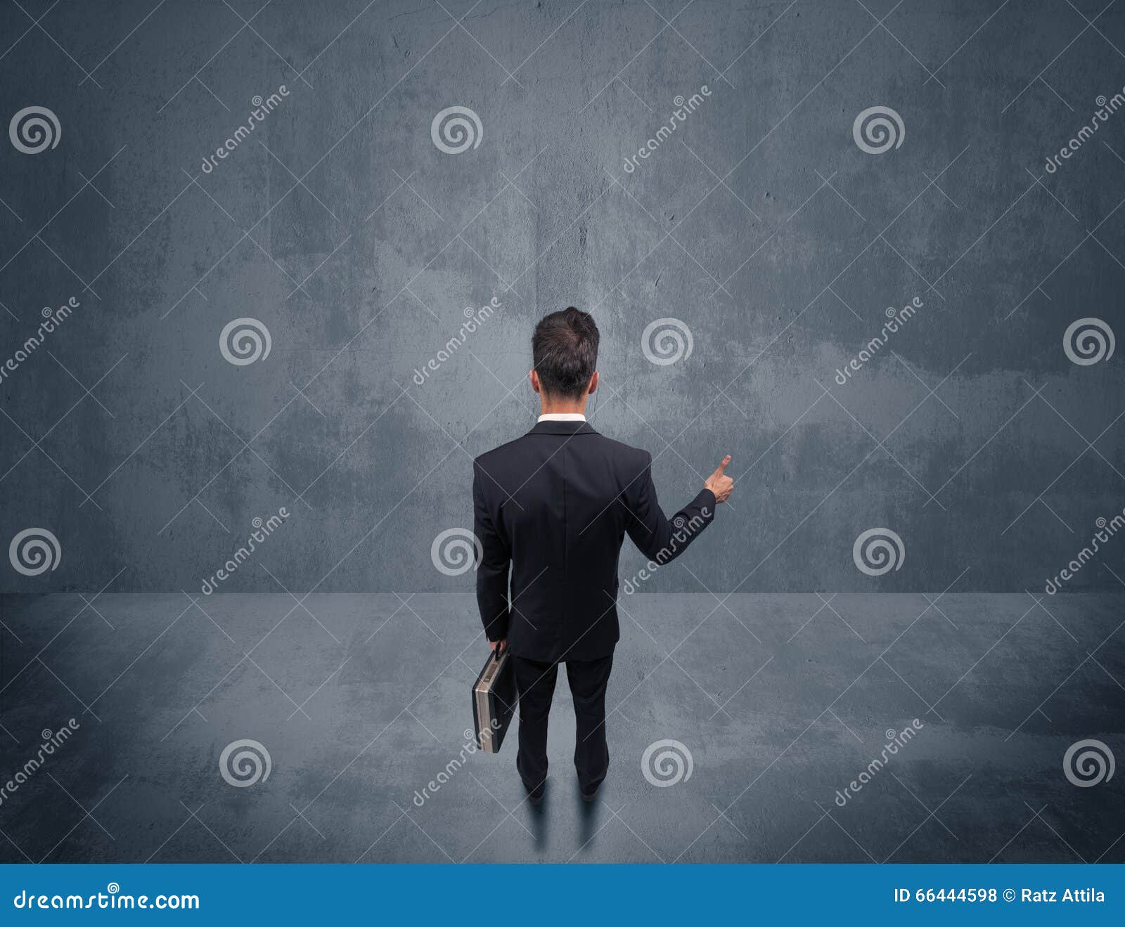 Businessman Standing in Front of Urban Wall Stock Photo - Image of ...