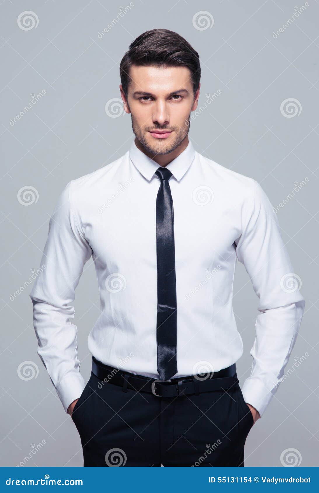 Businessman Standing with Hands in Pocket Stock Photo - Image of ...