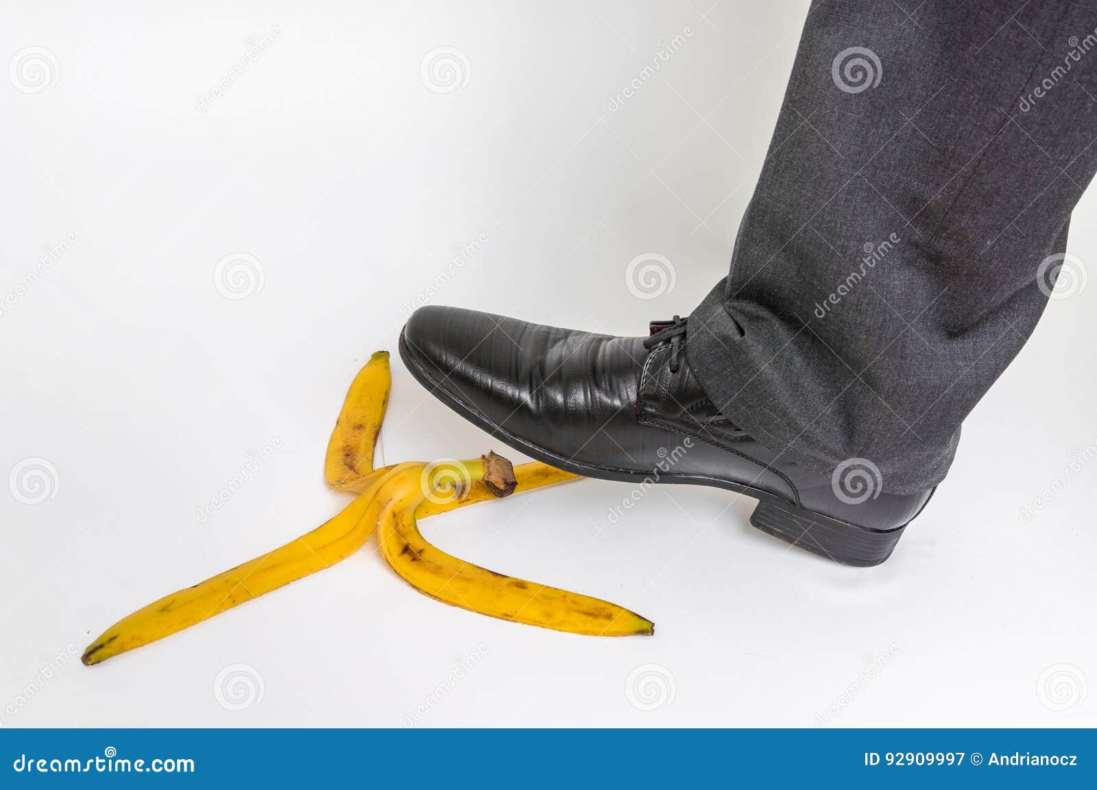 Businessman Stepping on Banana Peel - Business Risk Concept Stock Image ...