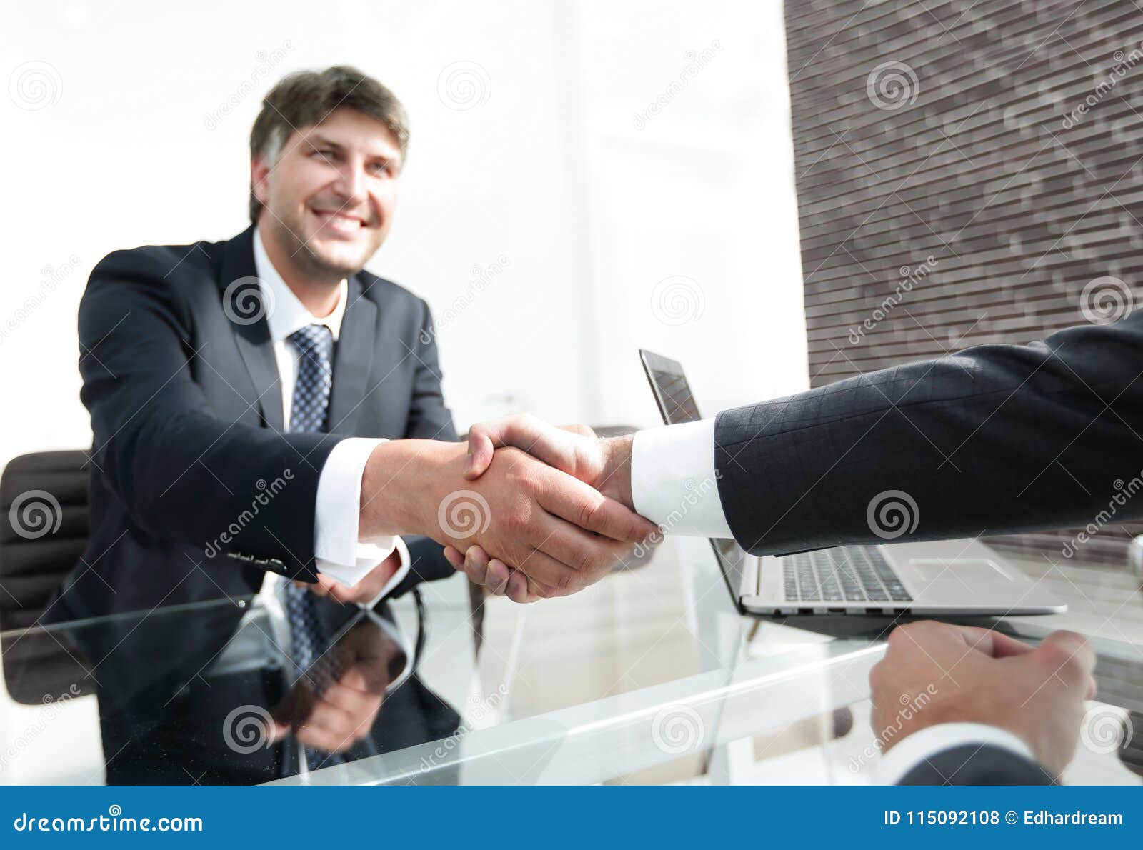 Businessman Stretches Out His Hand For A Handshake Stock Photo Image