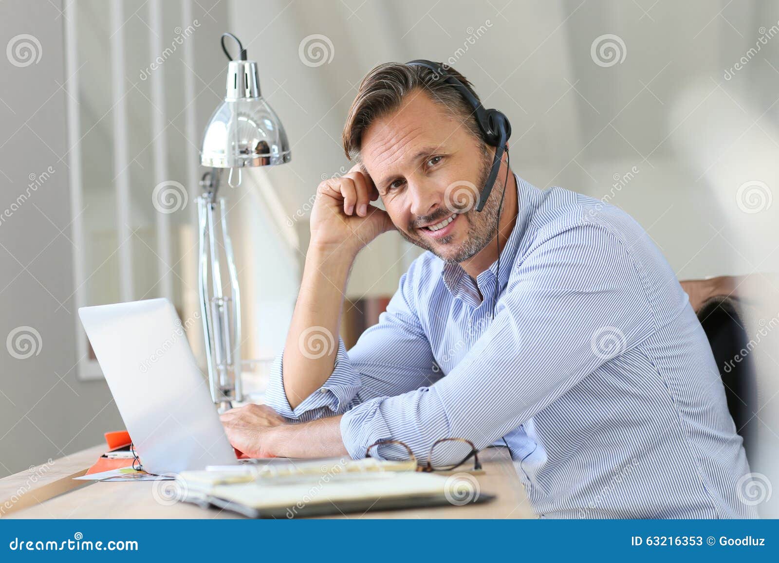 businessman teleworking with headset
