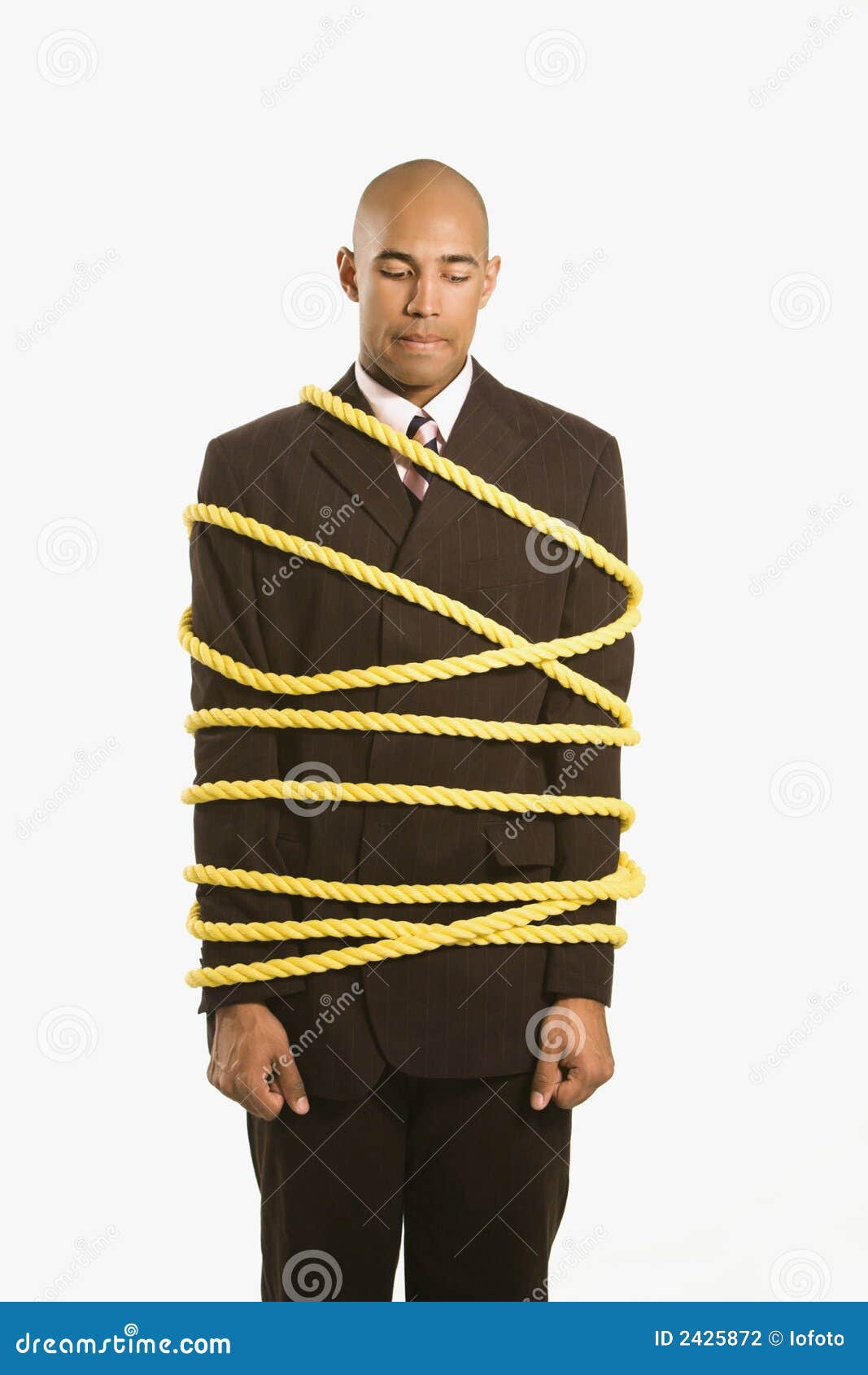 Businessman tied in rope. stock photo. Image of bound 2425872