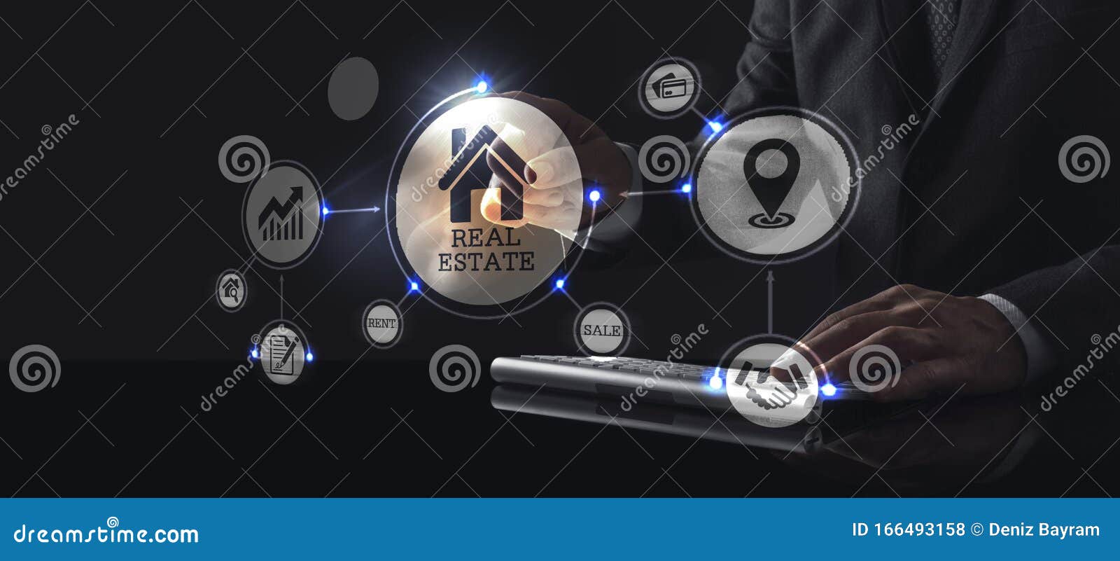 Businessman Touching Screen with about Real Estate Icon Stock Photo