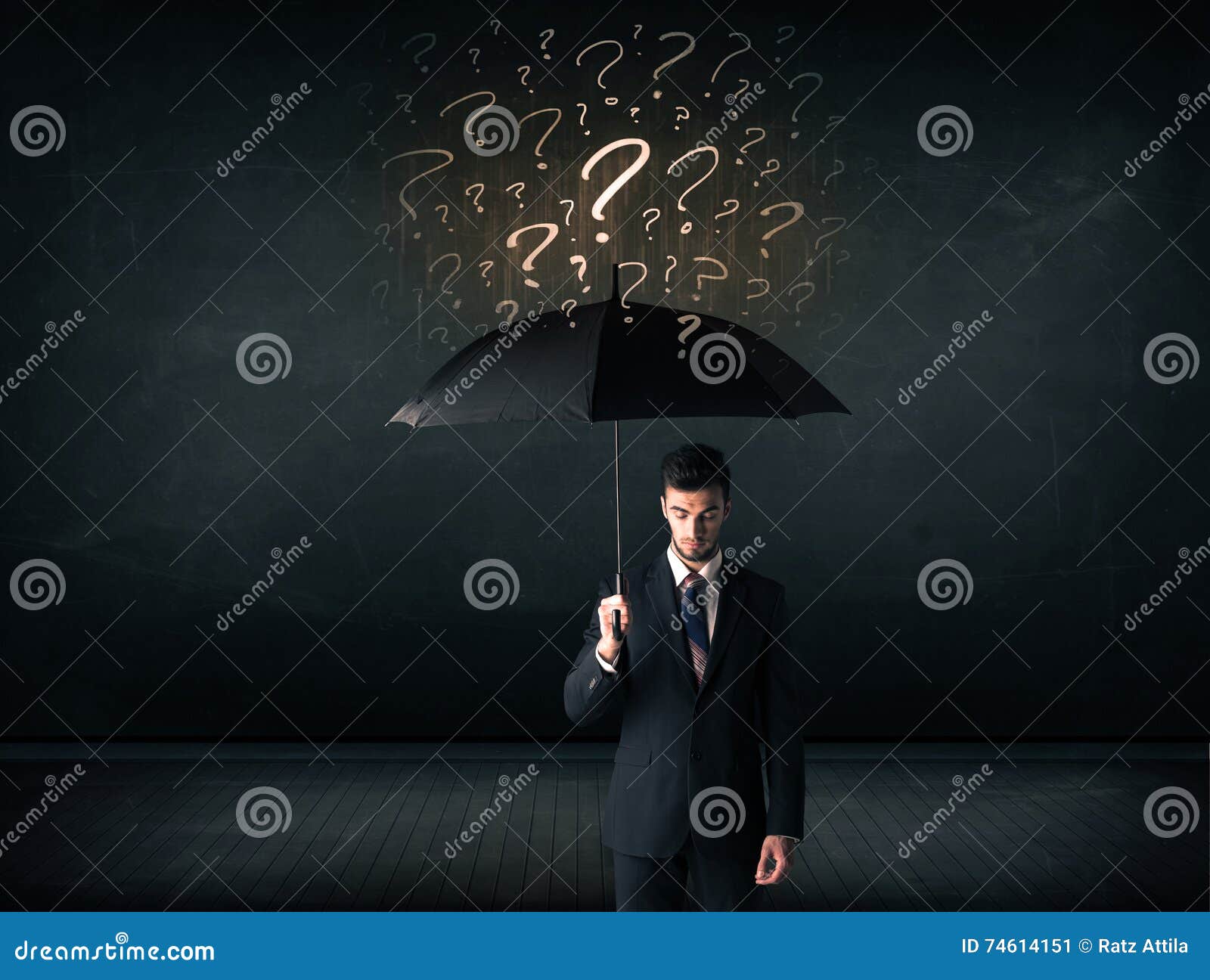 Businessman with Umbrella and a Lot of Drawn Question Marks Stock Image