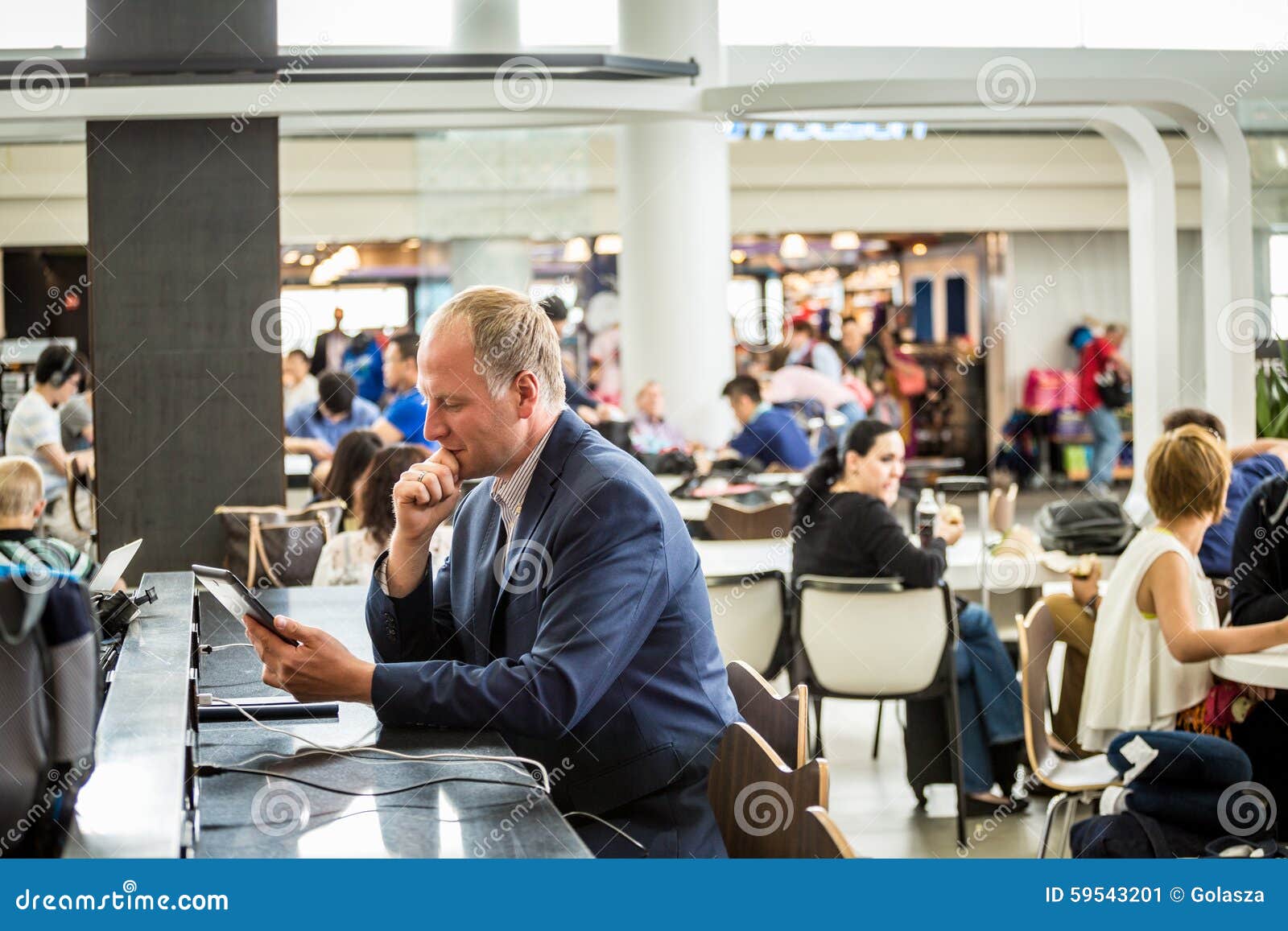 Businessman Using His Tablet at the Airport Stock Image Image of blue, executive 59543201