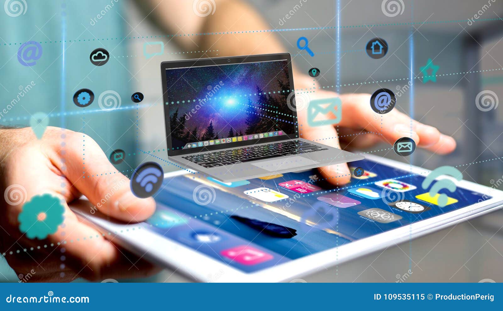 Businessman Using a Smartphone with a Computer Surrounding by Ap Stock