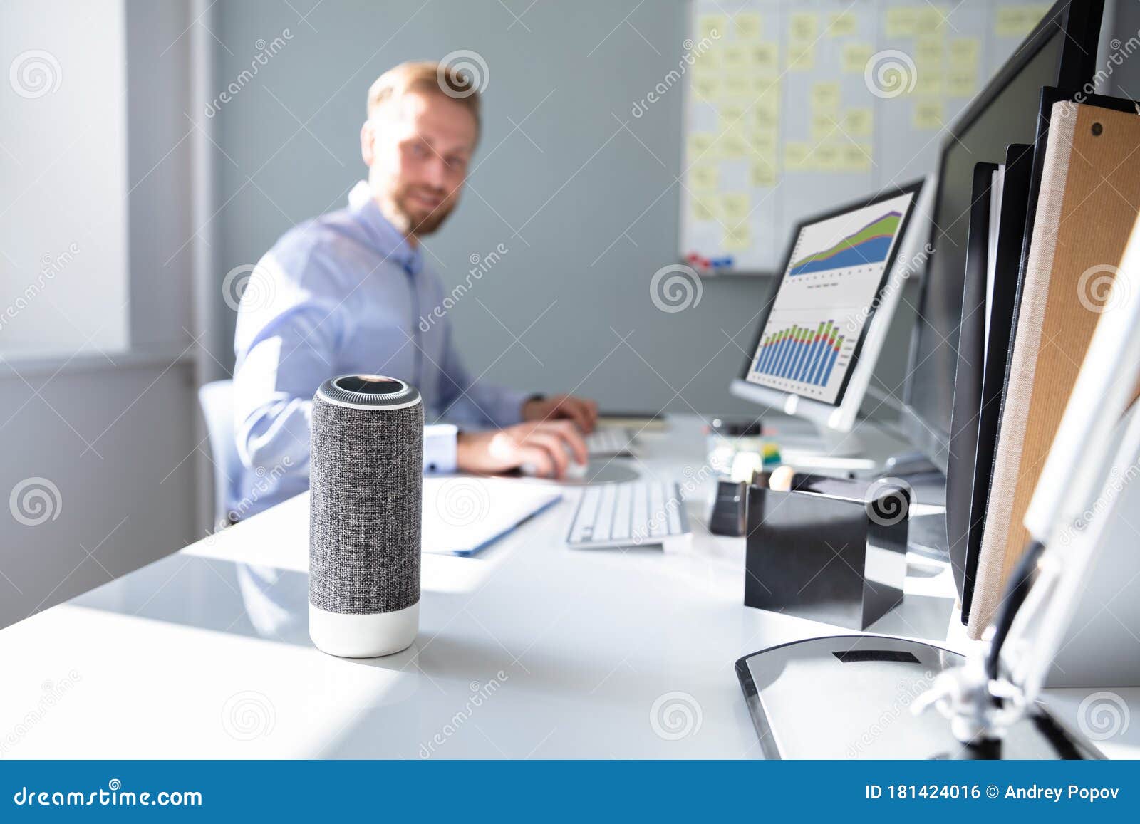 businessman using voice assistant