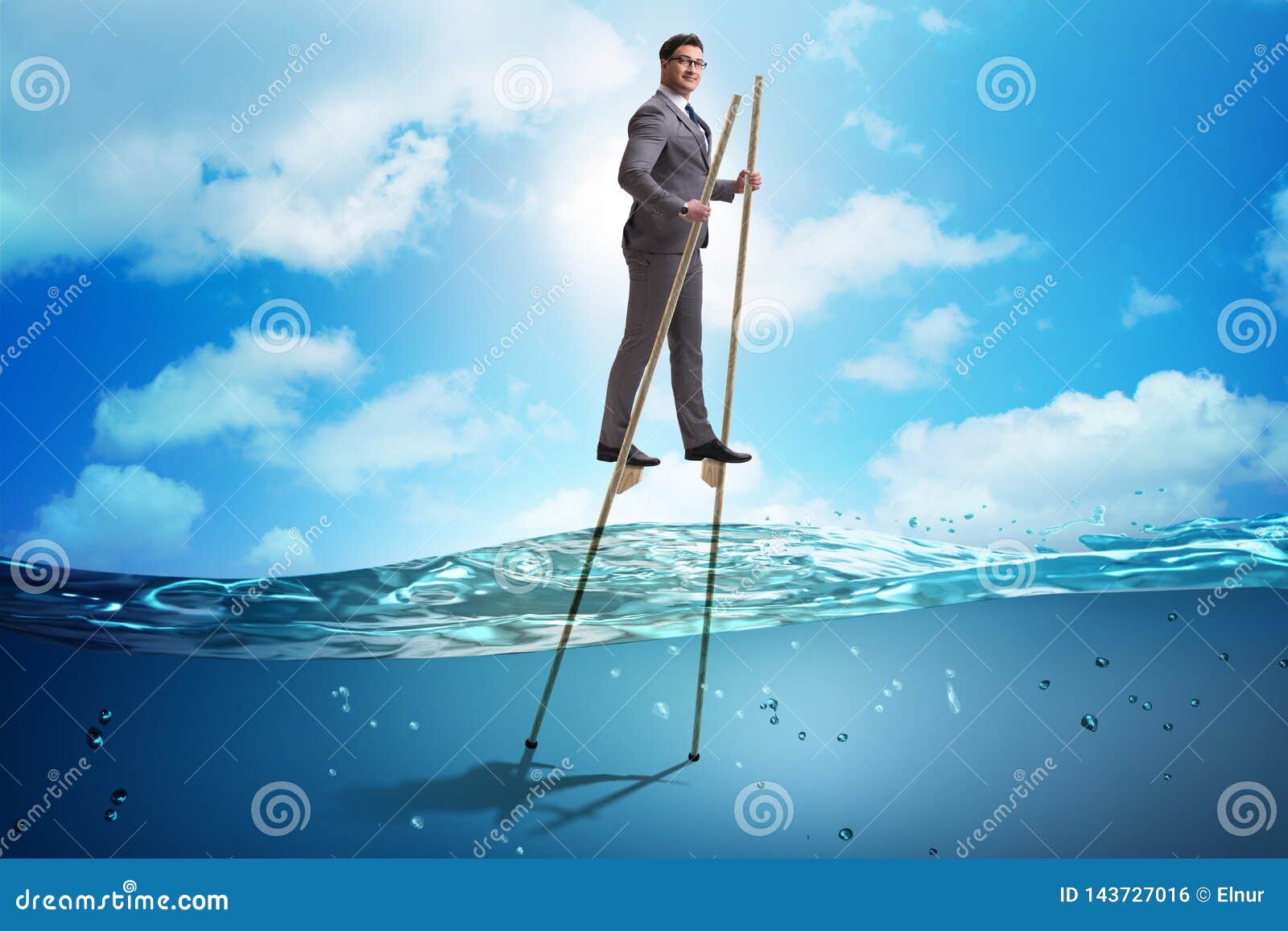 The Businessman Walking on Stilts in Water Sea Stock Photo Image of