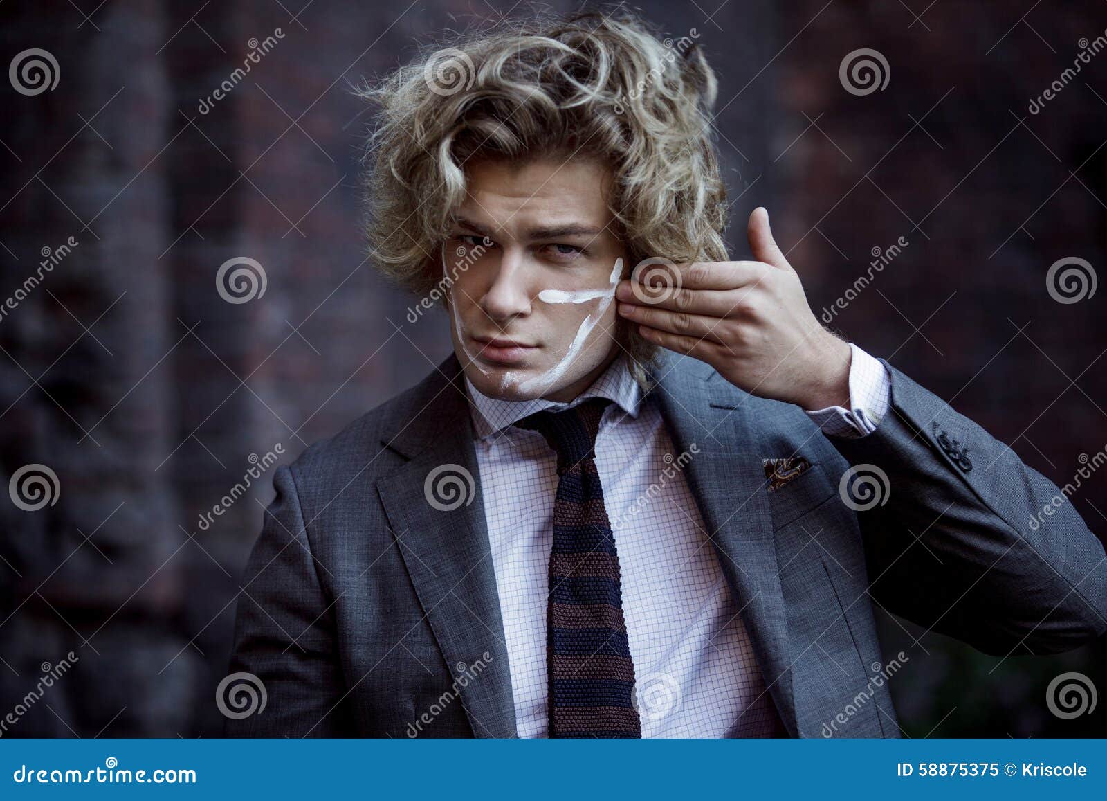 Businessman Warrior. Young Man With War Paint On Stock Photo