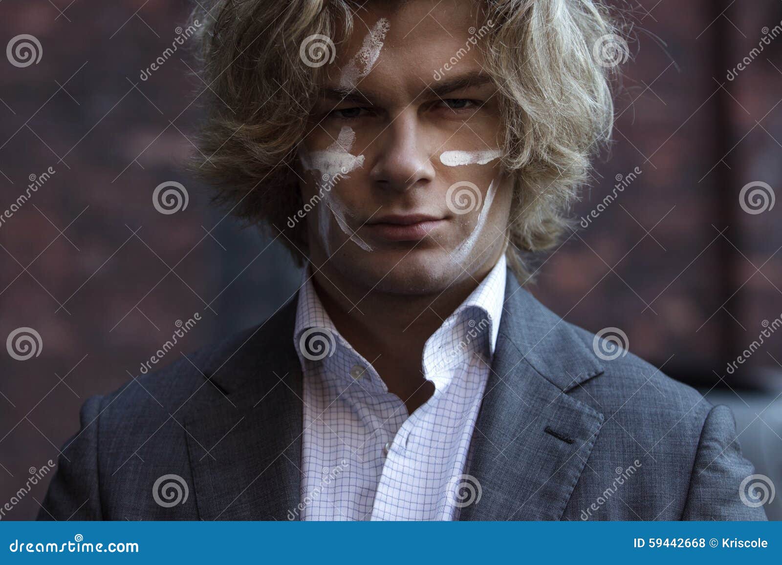 Businessman Warrior. Young Man Makes War Paint on Stock Photo Image