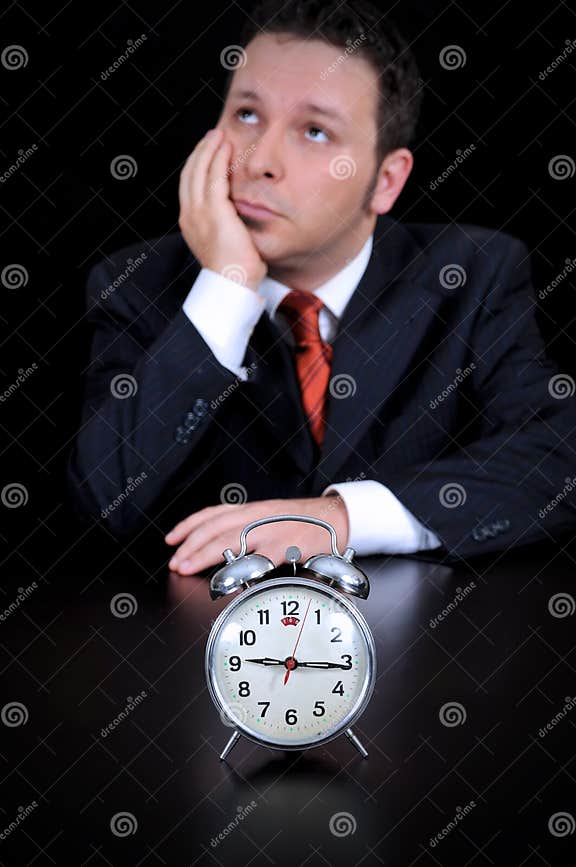 Businessman is Wasting Time Stock Image - Image of person, alarm: 45621329