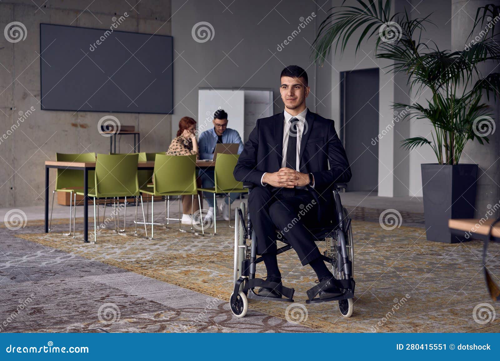 businessman in a wheelchair commands attention, izing resilience and success amidst a dynamic modern office