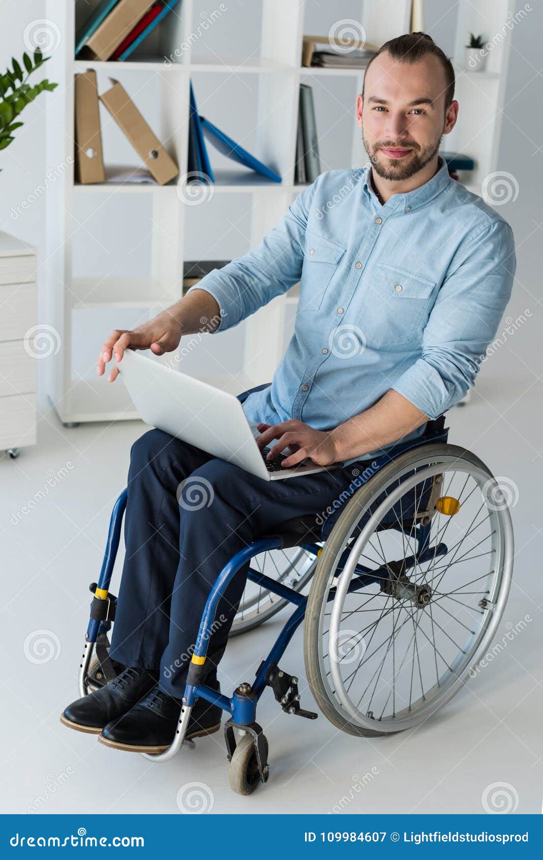 Businessman in Wheelchair Using Laptop Stock Image - Image of ...
