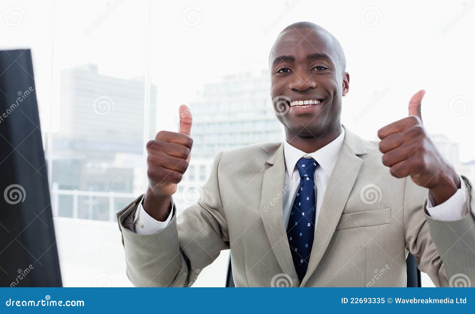 Businessman Working with a Computer with the Thumbs Up Stock Image