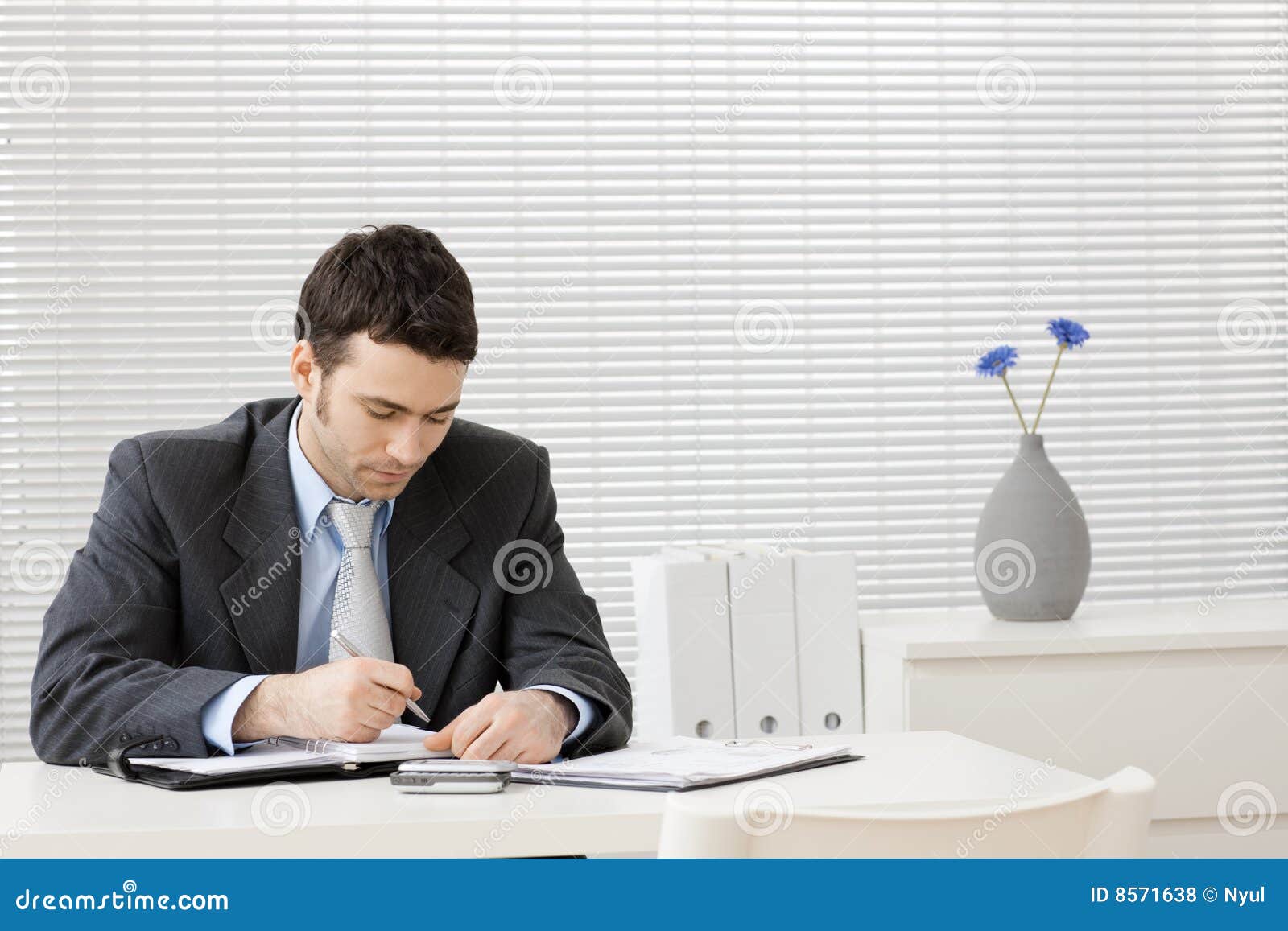 Businessman Working at Desk Stock Photo Image of document, dressed