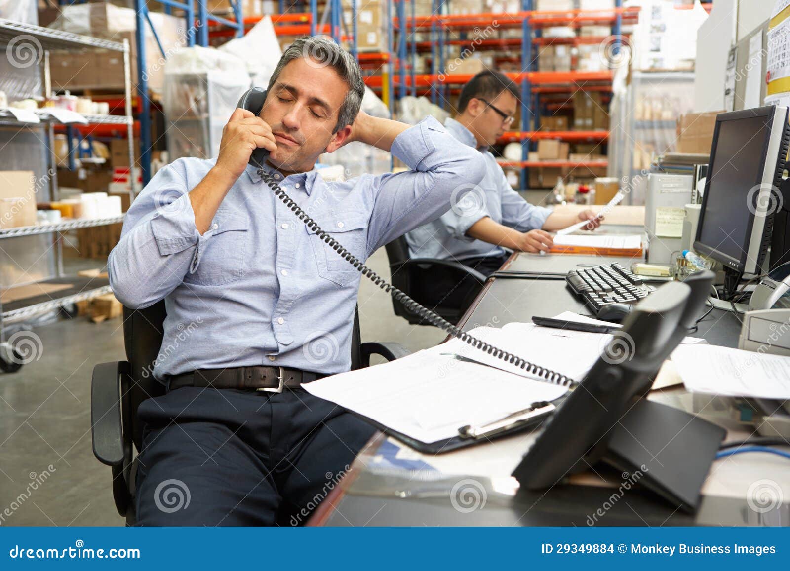 Businessman Working at Desk in Warehouse Stock Photo Image of owner, courier 29349884