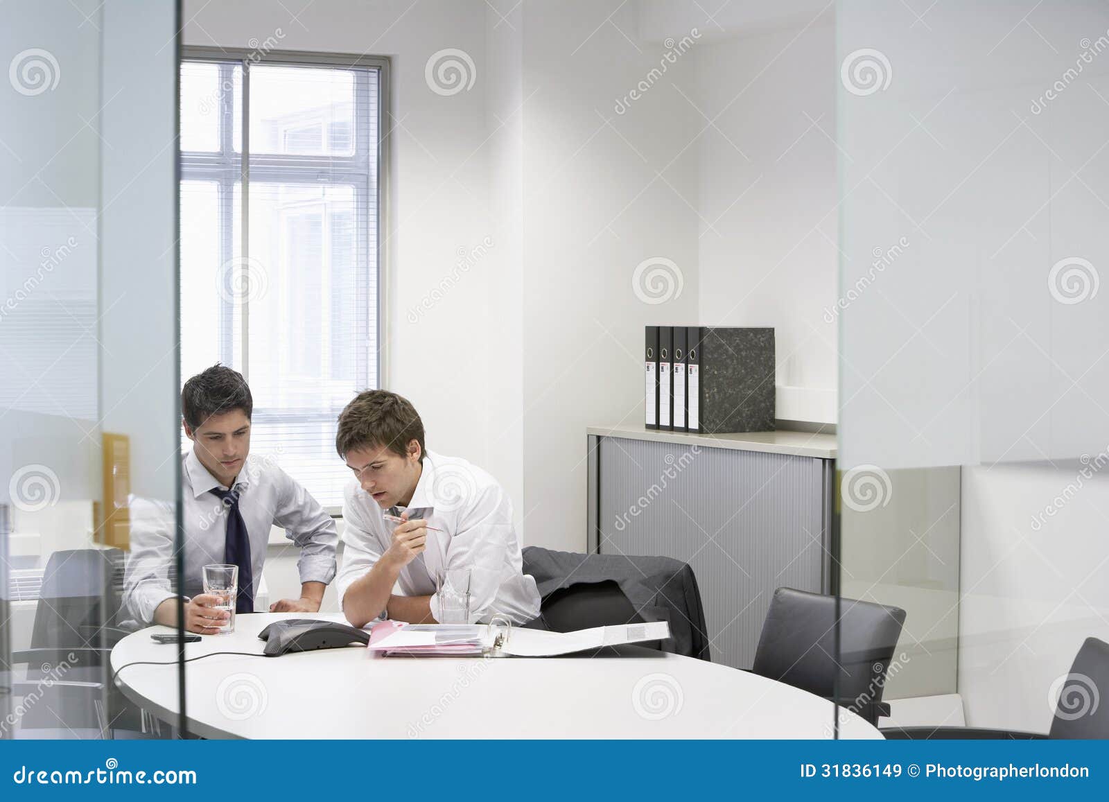 Businessmen Having Conference Call Stock Image Image of discussing, document 31836149