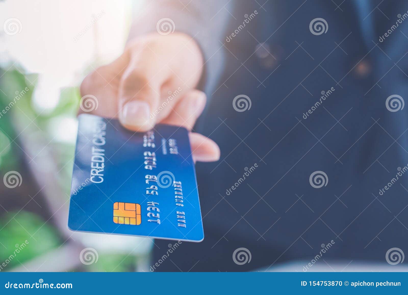 businessmen send blue credit cards for payment of goods