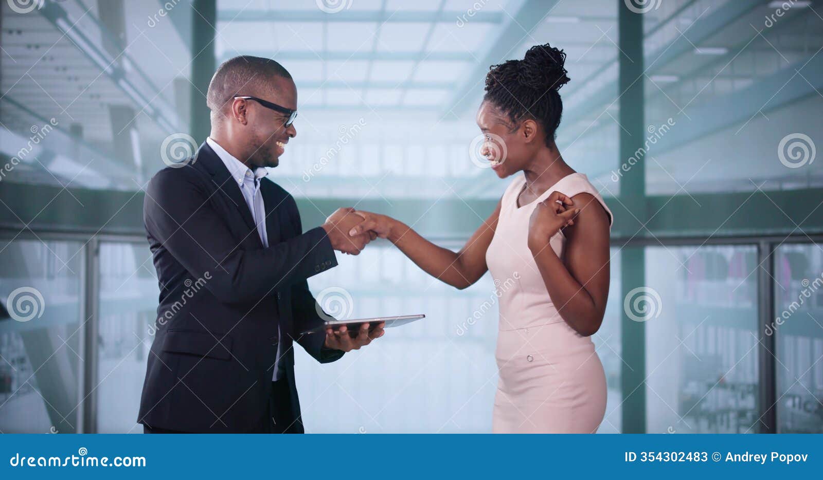 businesspeople discussing standing inside elevator