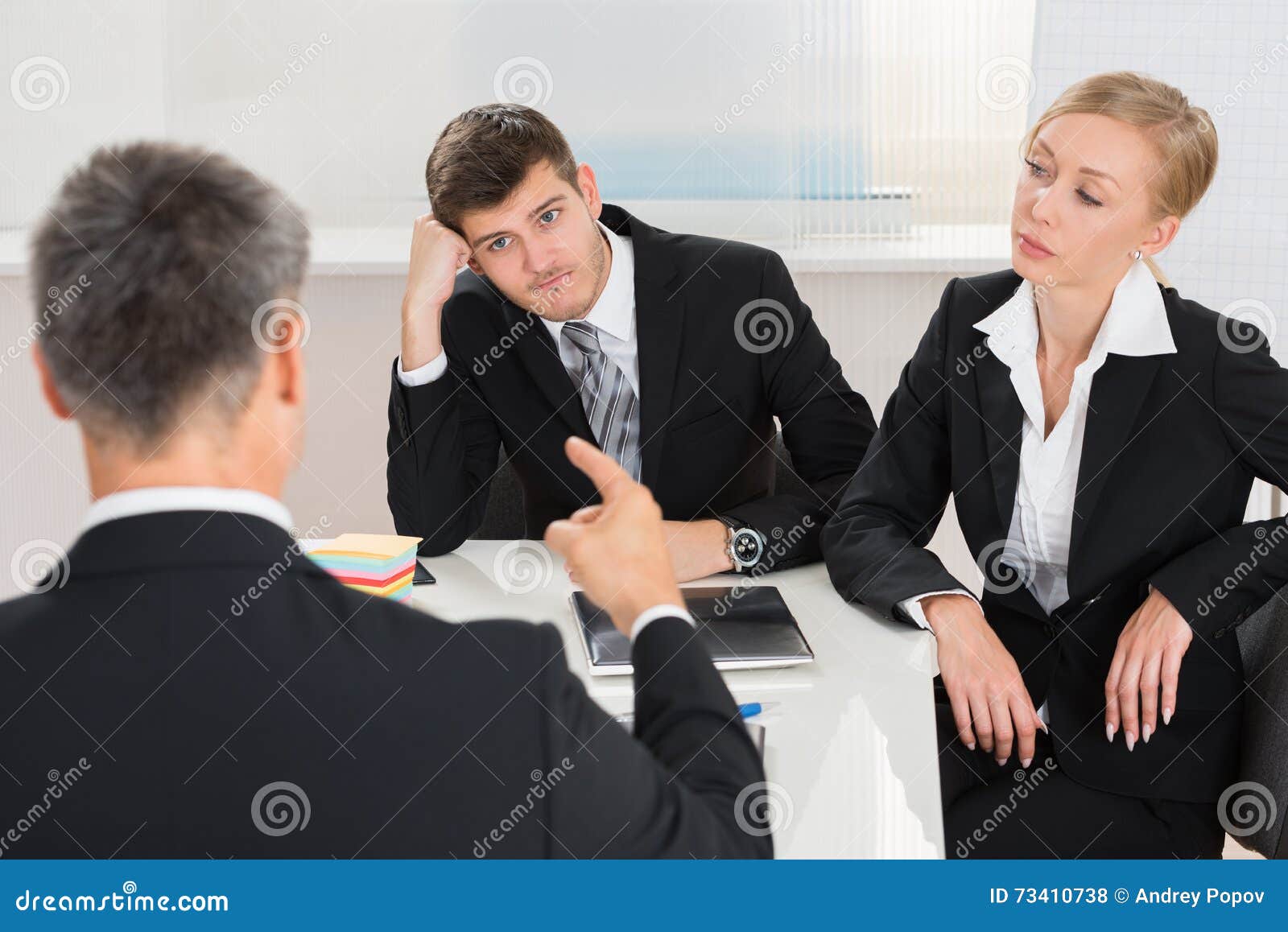 businesspeople having argument at workplace