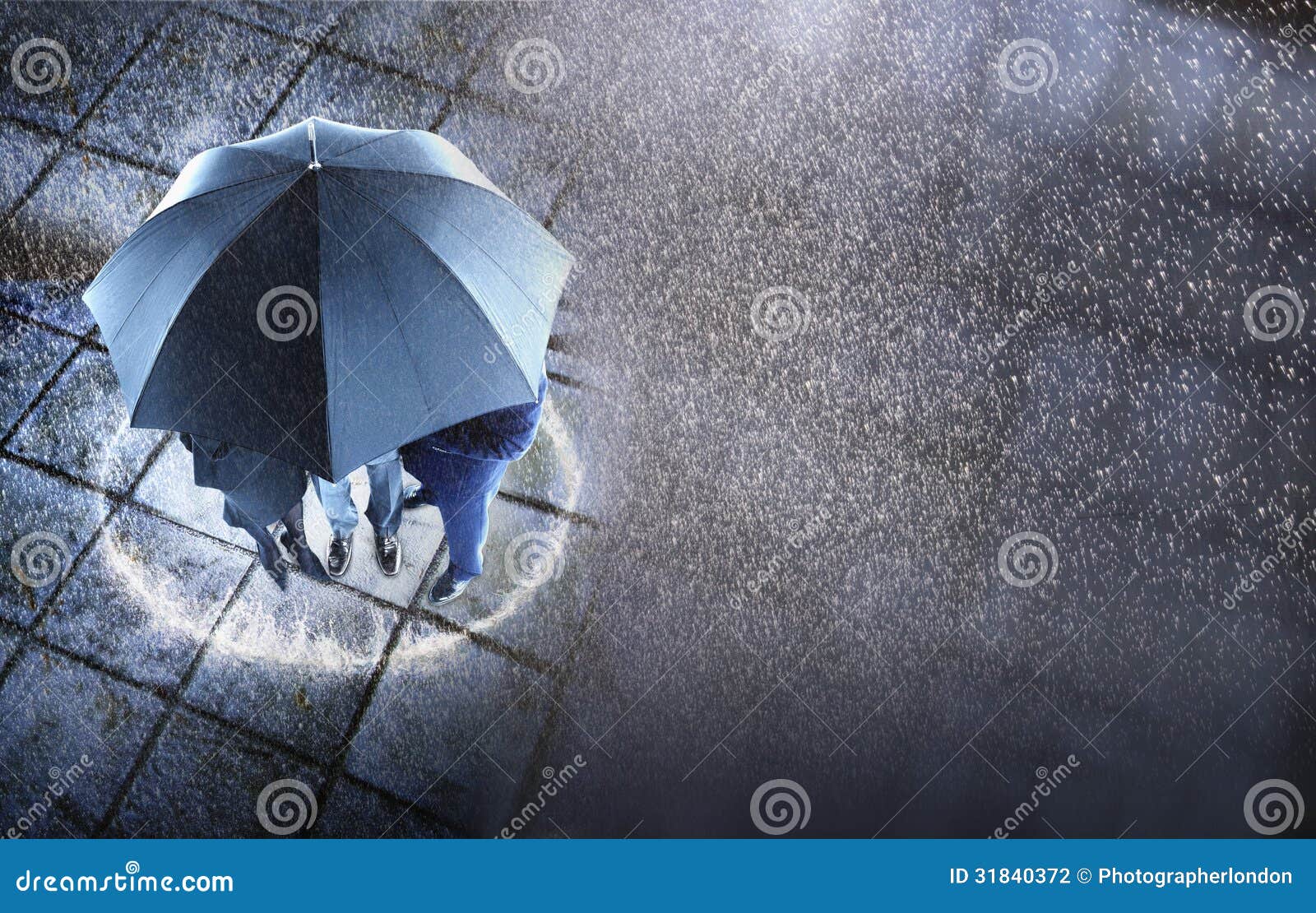 Businesspeople Sheltering Under One Umbrella in Rain Stock Photo Image of circular, formals