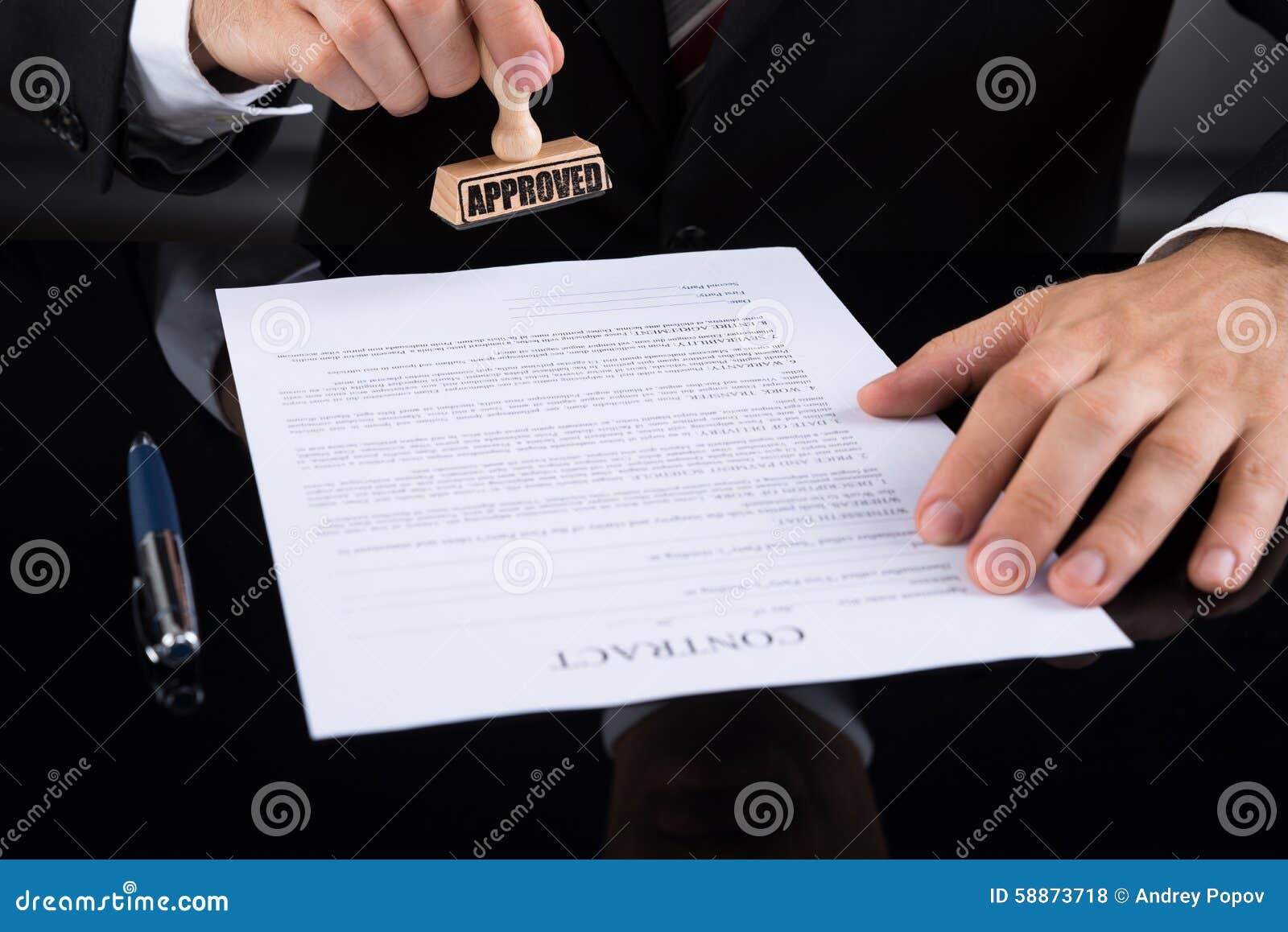 Businessperson Approving Contract Paper Stock Photo 