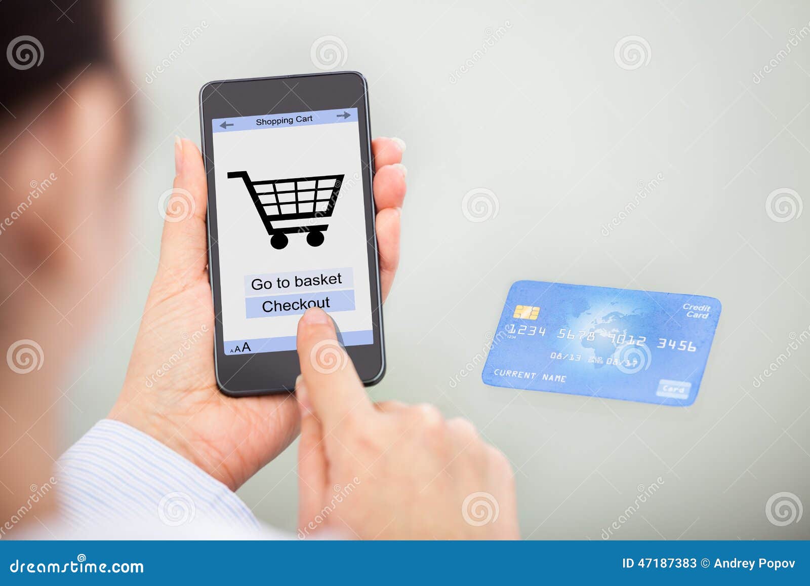 businessperson shopping online with mobile phone and credit card