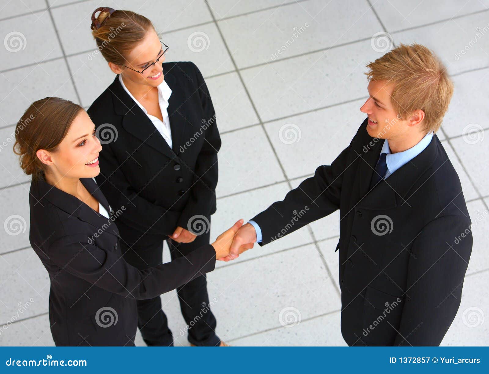 Businessteam Wrapping Up a Meeting with Handshake Stock Image Image