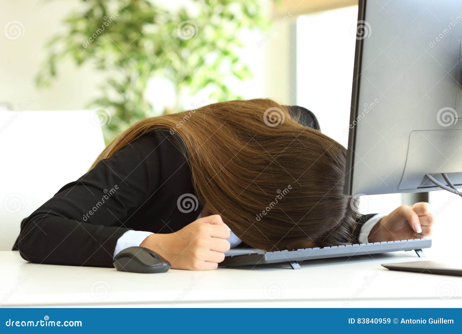 Businesswoman Banging The Head Against The Table Stock Image