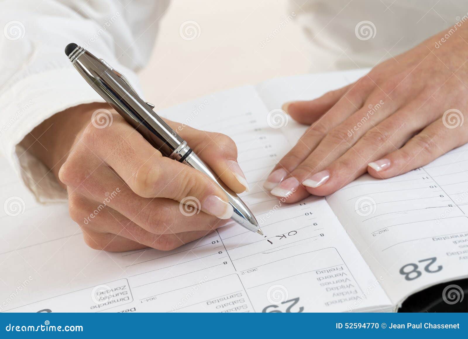 Businesswoman in Office Noting an Appointment Stock Photo - Image of ...