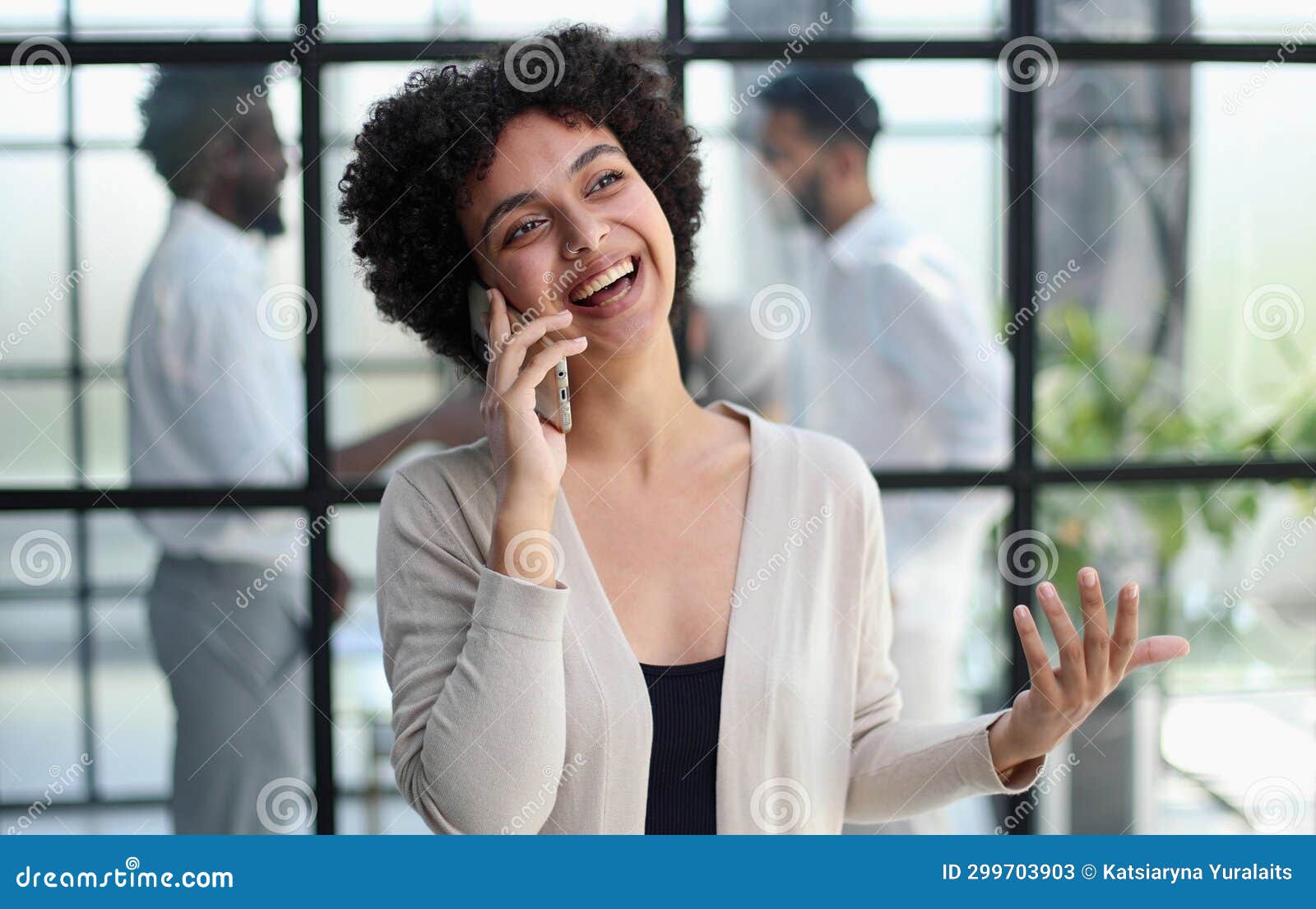 businesswoman with phone in modern office