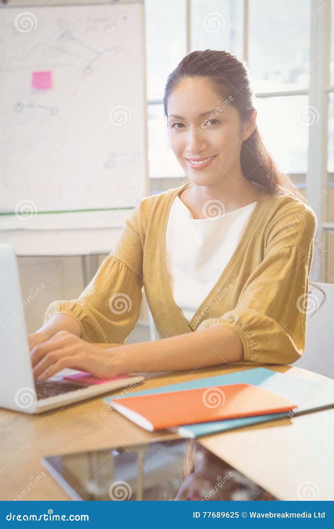 Businesswoman Posing on Her Desk Stock Image Image of desk, suit
