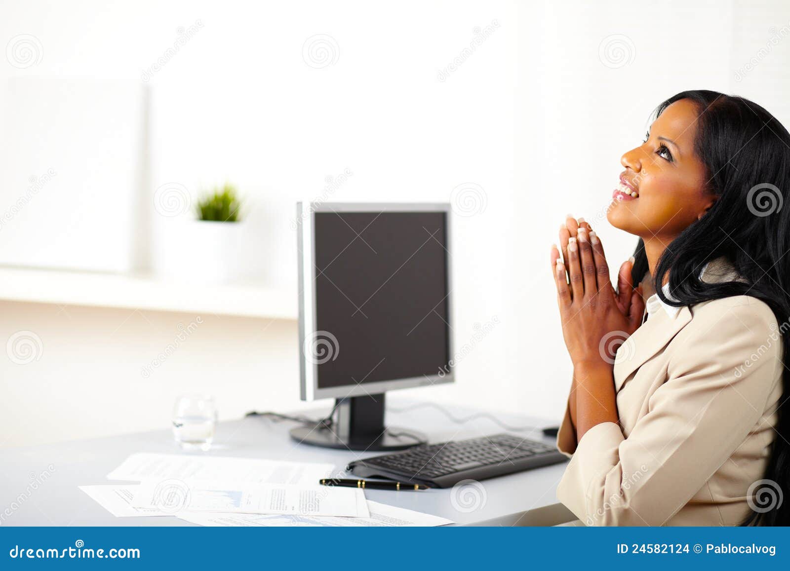 Businesswoman Praying At Work Stock Images Image 24582124