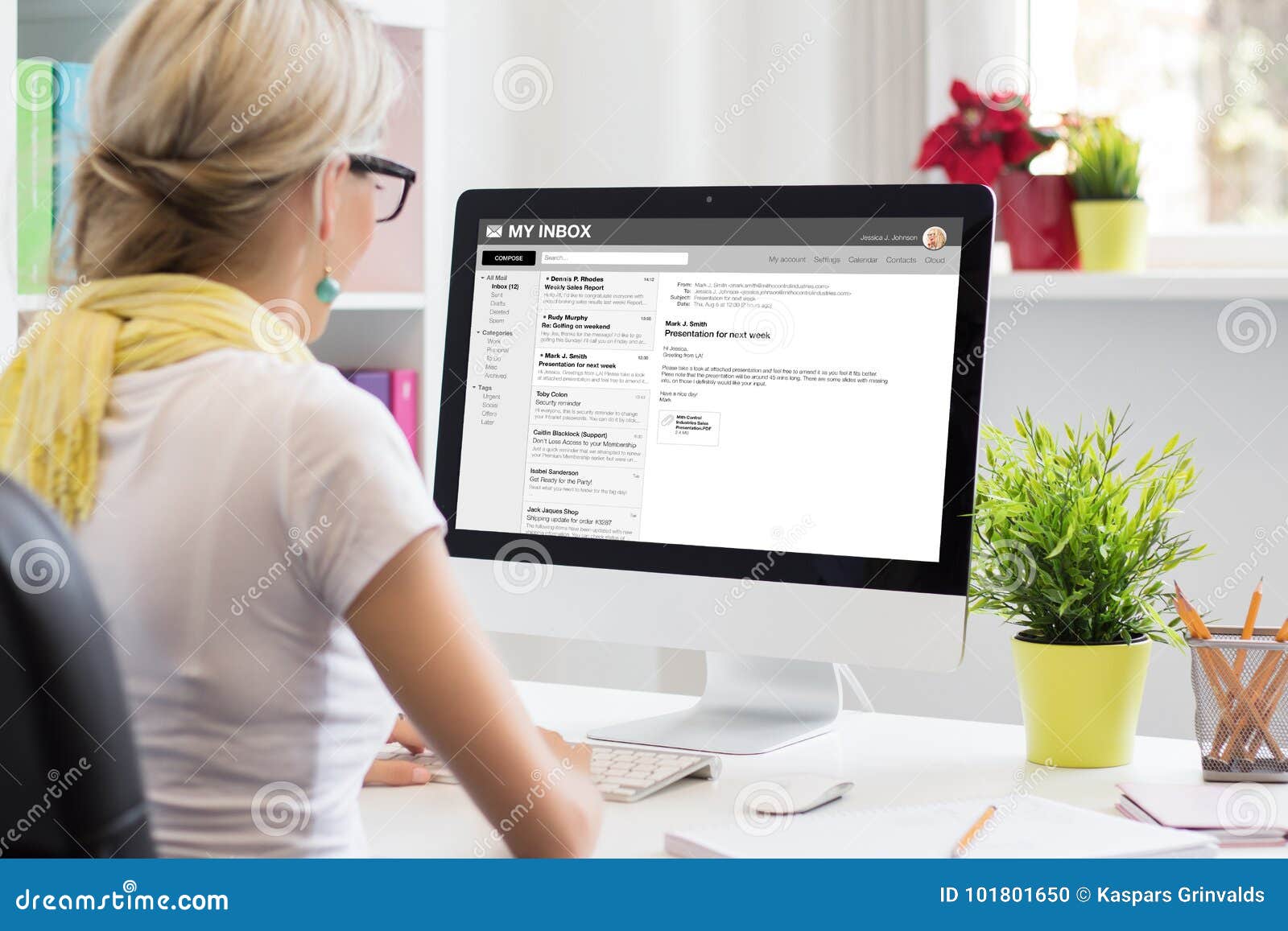 businesswoman reading email on computer.